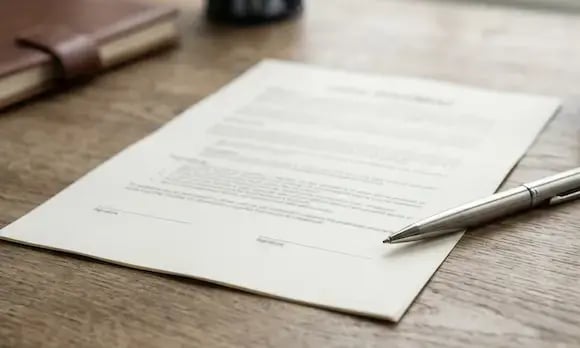 Legal document with pen on desk